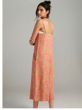 Bobo Choses Coral linen jumpsuit with Soft Yellow & Blue Accents